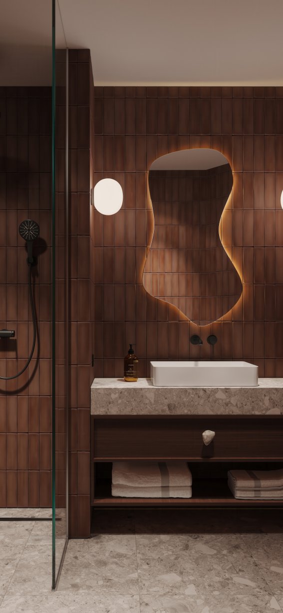 Im Badezimmer sind Holzpaneele und Stein integriert. Die Dusche ist offen und der Waschbereich hat ein einfaches Design.
