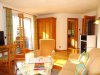 Wohnzimmer mit Kaminofen - Wohnung Nr. 6