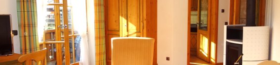 Wohnzimmer mit Kaminofen - Wohnung Nr. 6