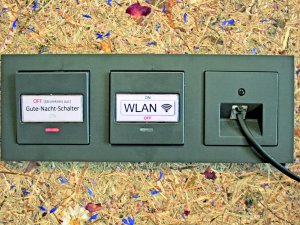 WLAN Anschluss mit Nachtruhe-Schalter im Biohotel Eggensberger in Füssen / Hopfen am See.