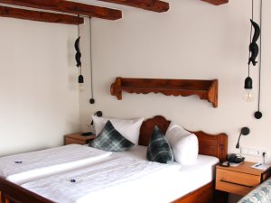 Einblick in eines der Zimmer im Hotel Restaurant Adler in Oberstaufen