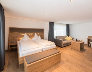 Einblick in ein Zimmer im Hotel Alpenblick in Fischen.