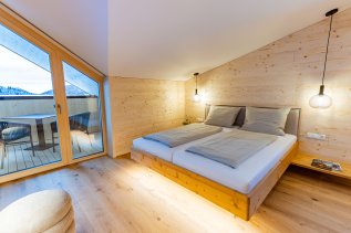 Einblick in ein Zimmer im Wald & Wiesn Berghotel Balderschwang.