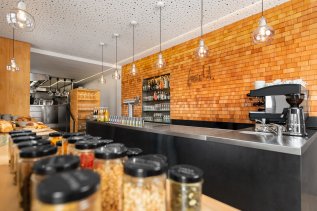 Blick auf die offene Küche im freistil. boutiquehotel & restaurant in Ofterschwang.