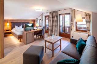 Einblick in ein Zimmer im Hotel Helmer in Schwangau.