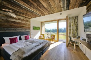Ein Zimmer des Genuss & Aktivhotel Sonnenburg in Riezlern.