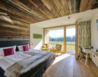 Ein Zimmer des Genuss & Aktivhotel Sonnenburg in Riezlern.
