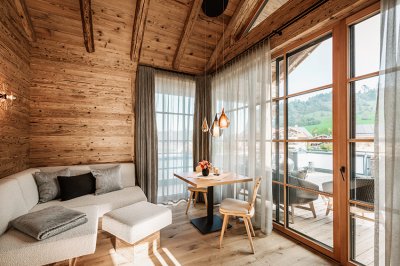 Das Wohnzimmer eines Chalets im Alpzitt Chalet Dorf in Burgberg.
