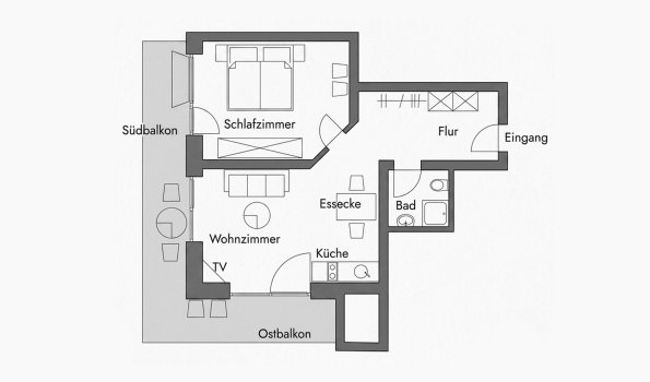 Grundriss einer Wohnung mit mehreren Räumen Die Zeichnung zeigt den Grundriss einer Wohnung mit Schlafzimmer, Wohnzimmer, Küche und Badezimmer.