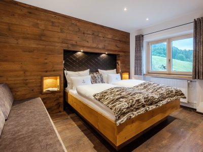 Schlafzimmer mit zusätzlicher Schlafgelegenheit