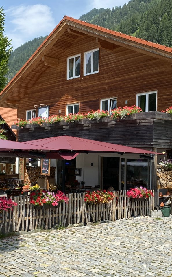 Grüner Hut - DEIN BERGHOTEL Blumenschmuck