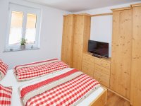 Schlafzimmer 1 mit TV