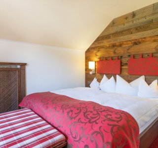 Schlafzimmer in Zimmer 28 im Berwanger Hof - 4 Sterne Hotel im Allgäu