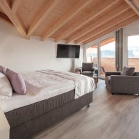 Bett mit Bergblick im Zimmer 765/14