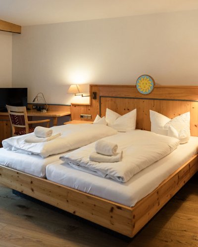 Kommen Sie zur Ruhe und lassen Sie es sich guttun. Unsere Zimmer im Hotel in Oberstdorf laden genau dazu ein.