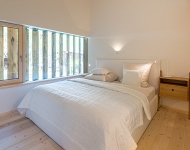 Schlafzimmer der Wohnung Edelwild