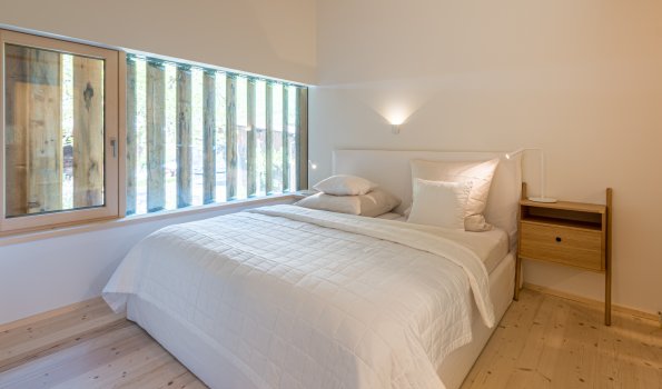 Schlafzimmer der Wohnung Edelwild
