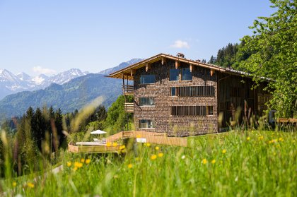 Haus mit Blick in die Berge