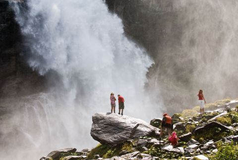 Refreshing spray of the Krimml Waterfalls on the viewing plateau