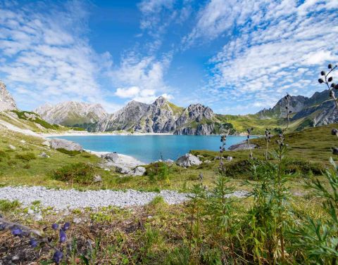 Une excursion au lac de Lünersee est incontournable lors de votre séjour à l'hôtel Explorer Montafon dans le Vorarlberg !
