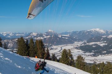 Tandemové létání v zimě v St. Johann