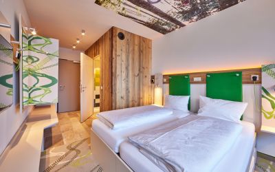 Das Explorer Hotel Zimmer- perfekt für Deinen sportlichen Urlaub in der Zugspitzregion bei Garmisch.