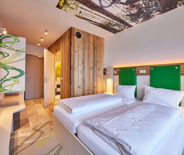 Das Explorer Hotel Zimmer- perfekt für Deinen sportlichen Urlaub in der Zugspitzregion bei Garmisch.