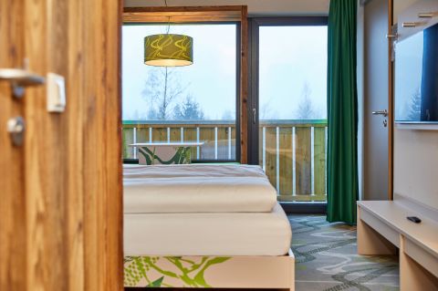 Willkommen in Deinem coolen Hotelzimmer im Explorer Hotel Garmisch in Farchant.