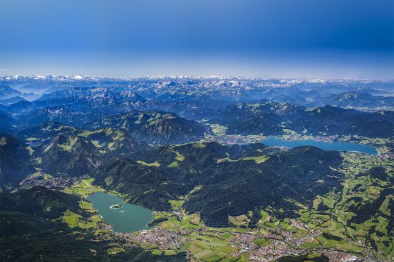 Impressive Alpine panorama from above, with views of the Schliersee and the Tegernsee.