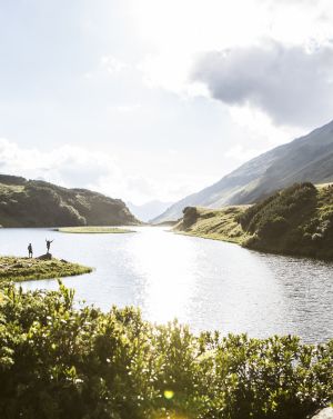 Frei fühlen - das kannst Du am Langsee im hinteren Silbertal im Montafon. Entdecke die Silvretta in Deinem Sommer-Urlaub in Österreich!