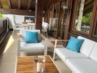 Überdachte Terrasse mit Lounge