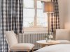 Sitzecke im Schlafzimmer Silberdistel | Ferienwohnung Lingg Oberstdorf