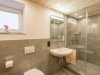 Badezimmer mit ebenerdiger Dusche | Ferienwohnung Lingg Oberstdorf, Allgäu Badezimmer mit ebenerdiger Dusche | Ferienwohnung Lingg Oberstdorf, Allgäu