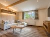 Gemütlicher Wohnraum mit Blick auf die Skisprungschanze | Ferienwohnung Lingg Oberstdorf