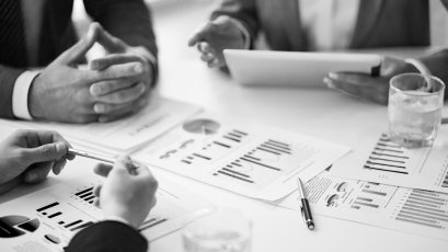 Close-up-businesspeople-working-with-documents-sw