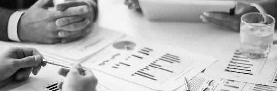 Close-up-businesspeople-working-with-documents-sw