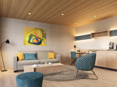 In einer modernen Wohnung sieht man das Wohnzimmer und die Küchenecke. Es gibt eine Couch, einen Tisch und einen Stuhl.