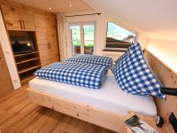 Ferienwohnung Anna Schlafen mit Zirbenholz-Bett