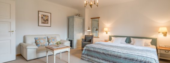 Heimelige Atmosphäre in unserem Doppelzimmer mit Kamin