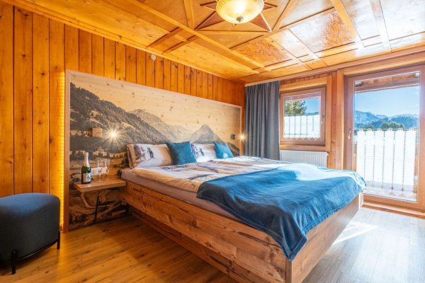 Schlafzimmer mit Balkonzugang