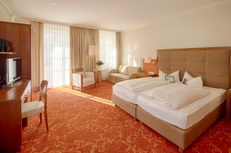 Unsere gemütlichen Zimmer im Grandhotel-Stil bieten Ihnen jede Menge Platz.