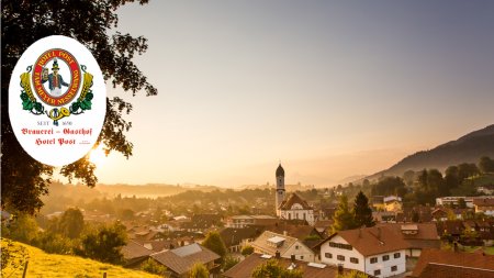 Nesselwang im Herbst mit Logo