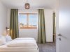 Kurhotel-jakob-fuessen-im-allgaeu-unterkunft-ferienwohnung-zimmer-01-001
