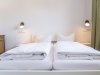Kurhotel-jakob-fuessen-im-allgaeu-unterkunft-ferienwohnung-zimmer-01-004