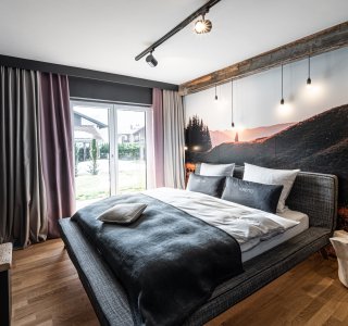 Schlafzimmer in der Wohnung Bienenstock im EG