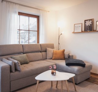 Wohnzimmer mit Terrasse - Family Aparts Alpensalamander