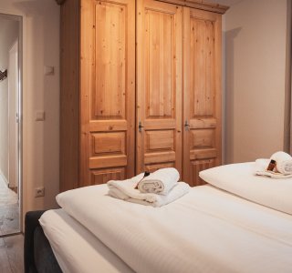 Schalfzimmer mit Boxspringbett - Family Aparts Murmeltier