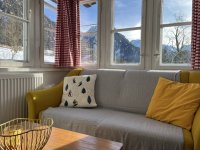 Wohnzimmer mit Blick auf die Berge (Ferienhütte)