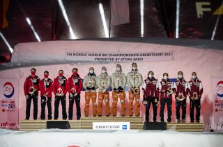 Silver medal winner Team Austria (L-R), Gold medal winner Team Germany and Bronze medal winner Team Poland pose during the medal