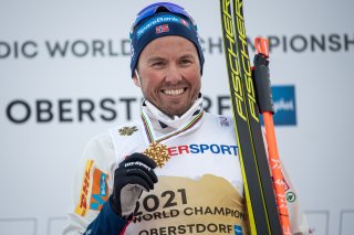 Gold medal winner Emil Iversen of Norway poses during the Cross Country Men 50KM Mass Start Classic medal ceremony